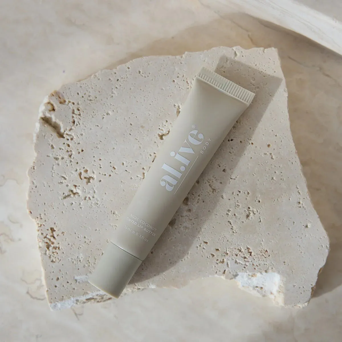 al.ive body Tinted Lip Butter - Nude Coconut