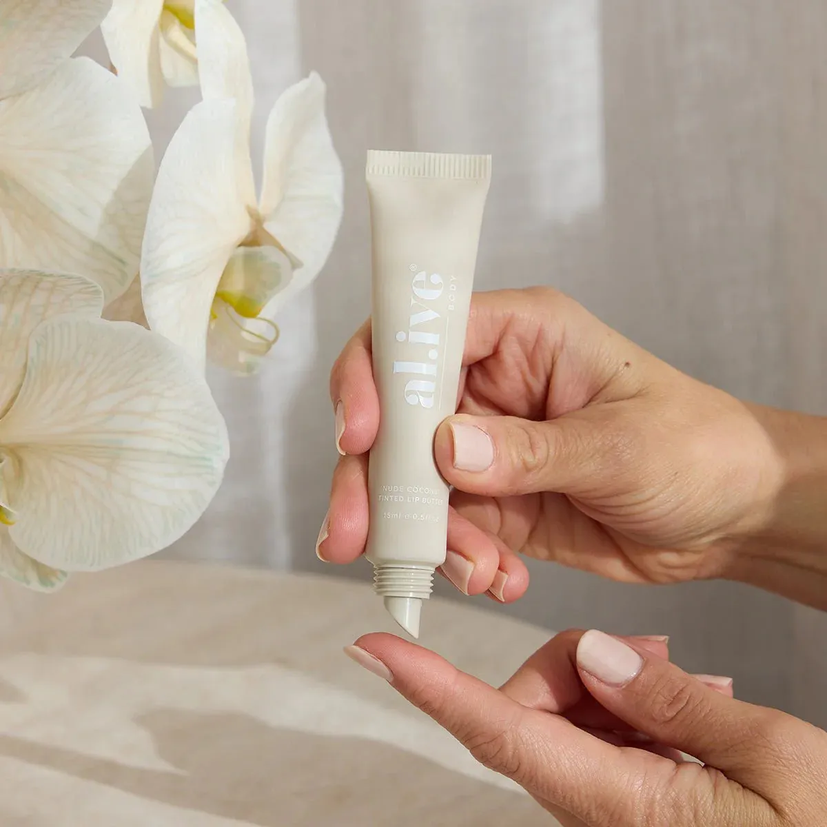 al.ive body Tinted Lip Butter - Nude Coconut