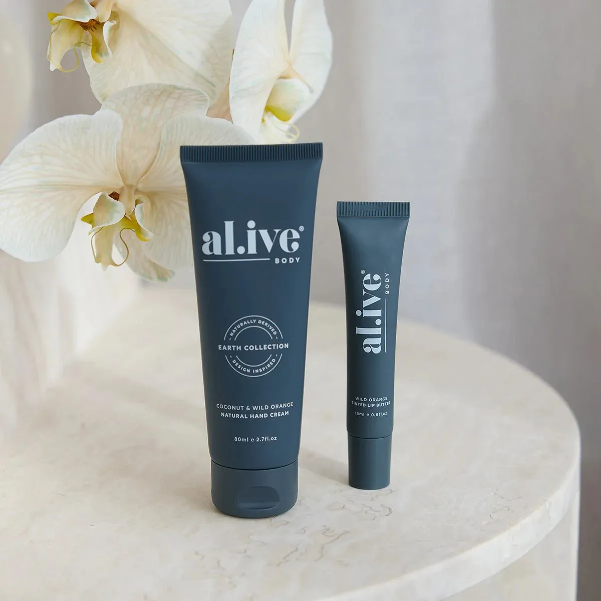 al.ive body Tinted Lip Butter - Wild Orange