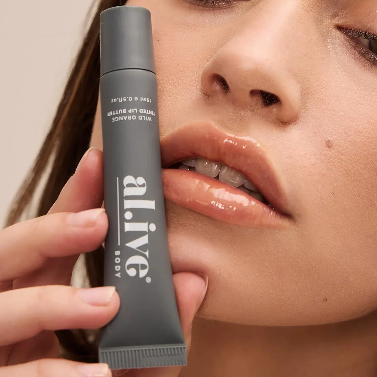 al.ive body Tinted Lip Butter - Wild Orange
