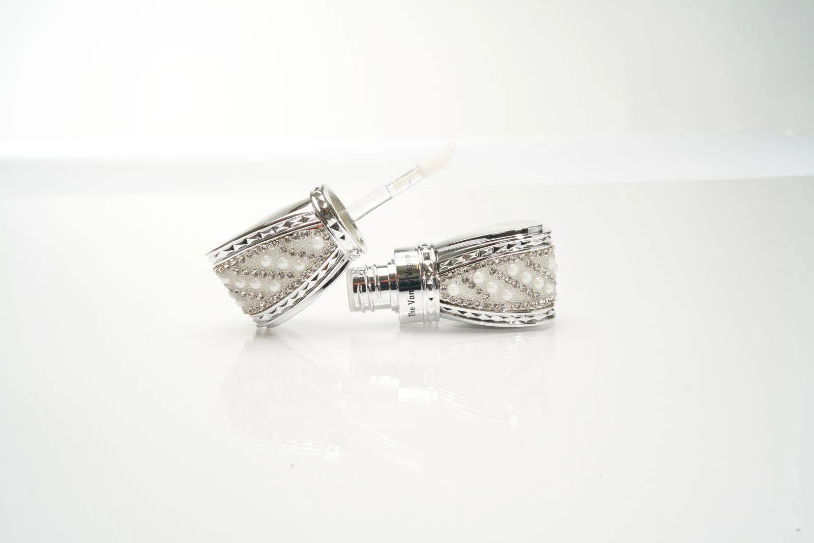 Signature Gloss Silver and Gold Tone Bow
