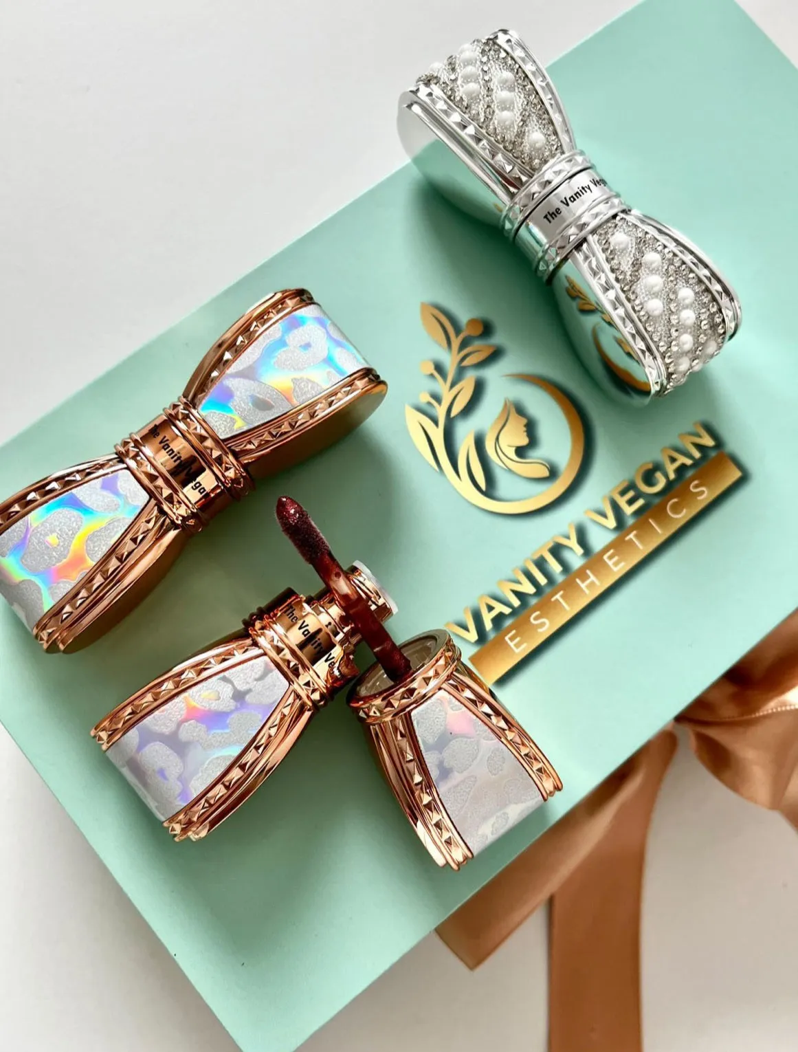 Signature Gloss Silver and Gold Tone Bow