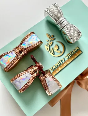 Signature Gloss Silver and Gold Tone Bow